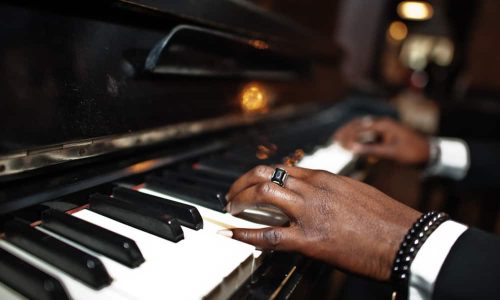 Artist organizing music ideas with DAW, notes, and workflow tools.