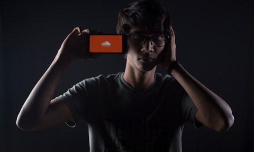 Artist starting a SoundCloud promotion campaign by uploading music