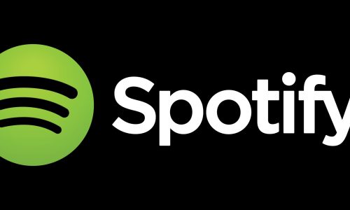 Artist using Spotify promotion strategies with playlists, ads, and branding